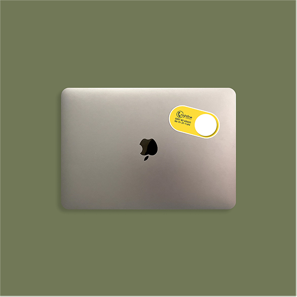 A sticker on the backside of a macbook.